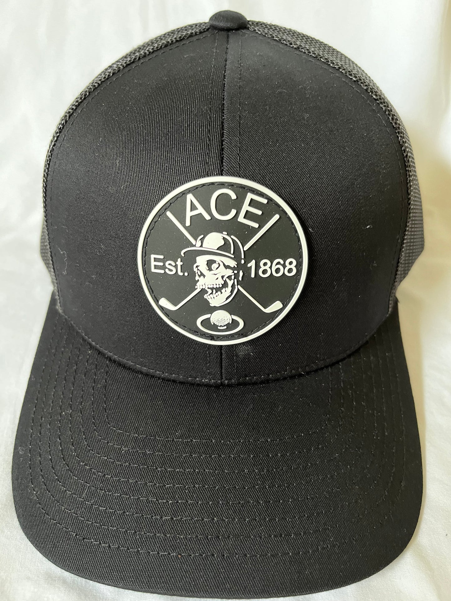 Ace Skull & Sticks Caddy Truckers Hat/Black & Black